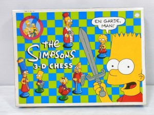  the SIMPSONS 3-D CHESSの箱画像。ロゴや、キャラクターのイラストが描かれている。