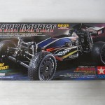 TAMIYA 1/10 RC dark impactの箱。白いロゴやラジコンのイラストが書かれている。